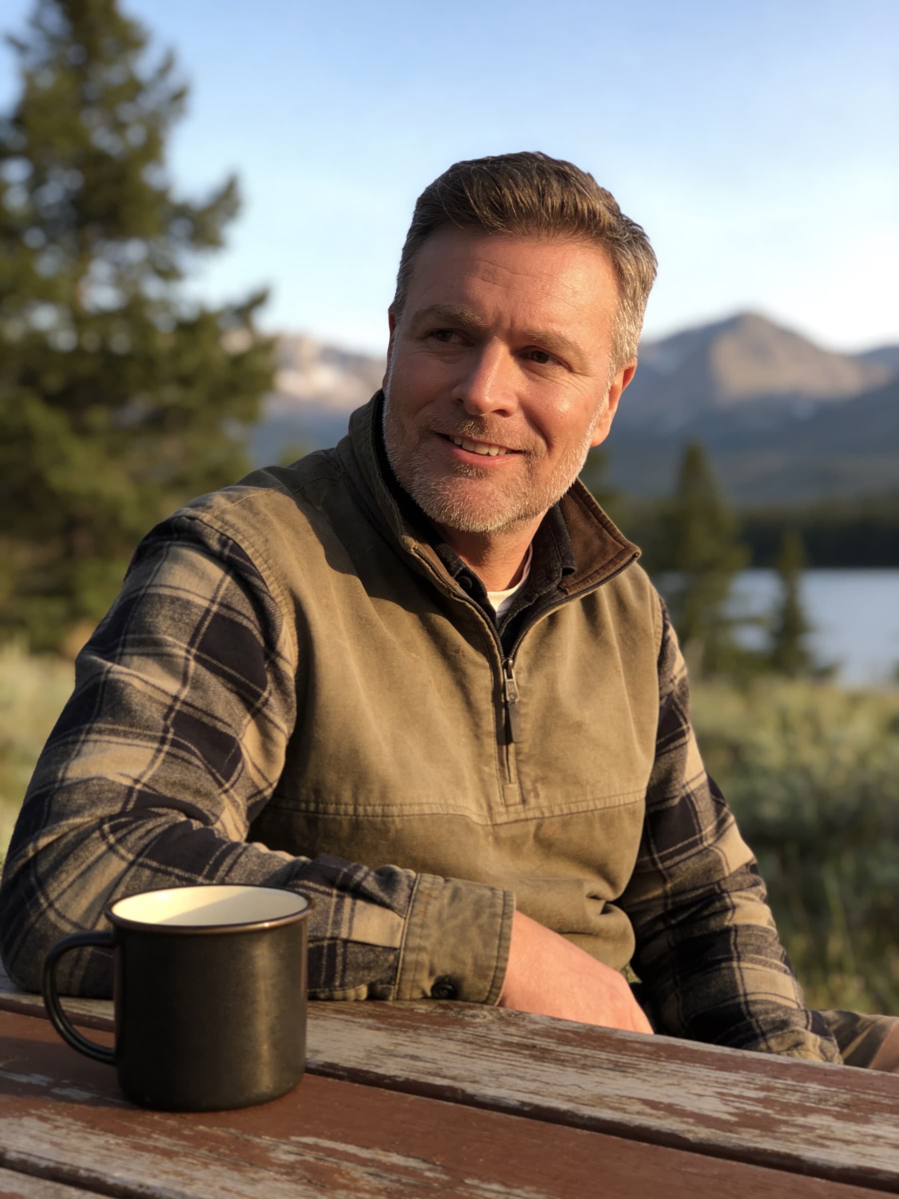 Kelsey Stuart with coffee outdoors in Montana
